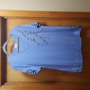 Periwinkle tinix with ryched sleeves and bottom ruching and copper decor on fron